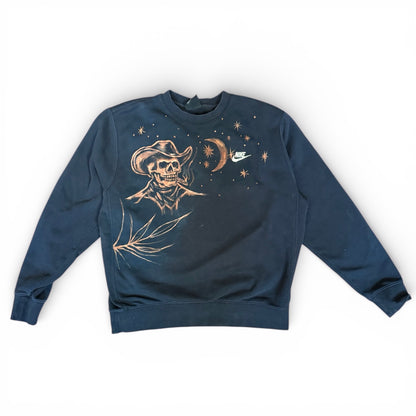 Navy blue sweatshirt with a skull wearing a cowboy hat and stars design on a white background