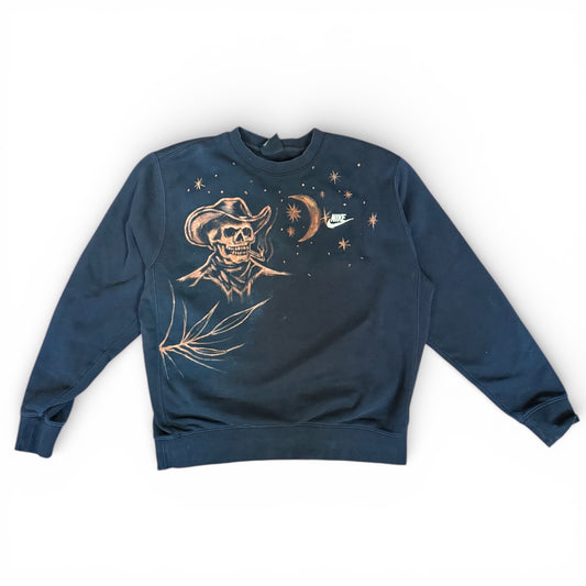 Navy blue sweatshirt with a skull wearing a cowboy hat and stars design on a white background